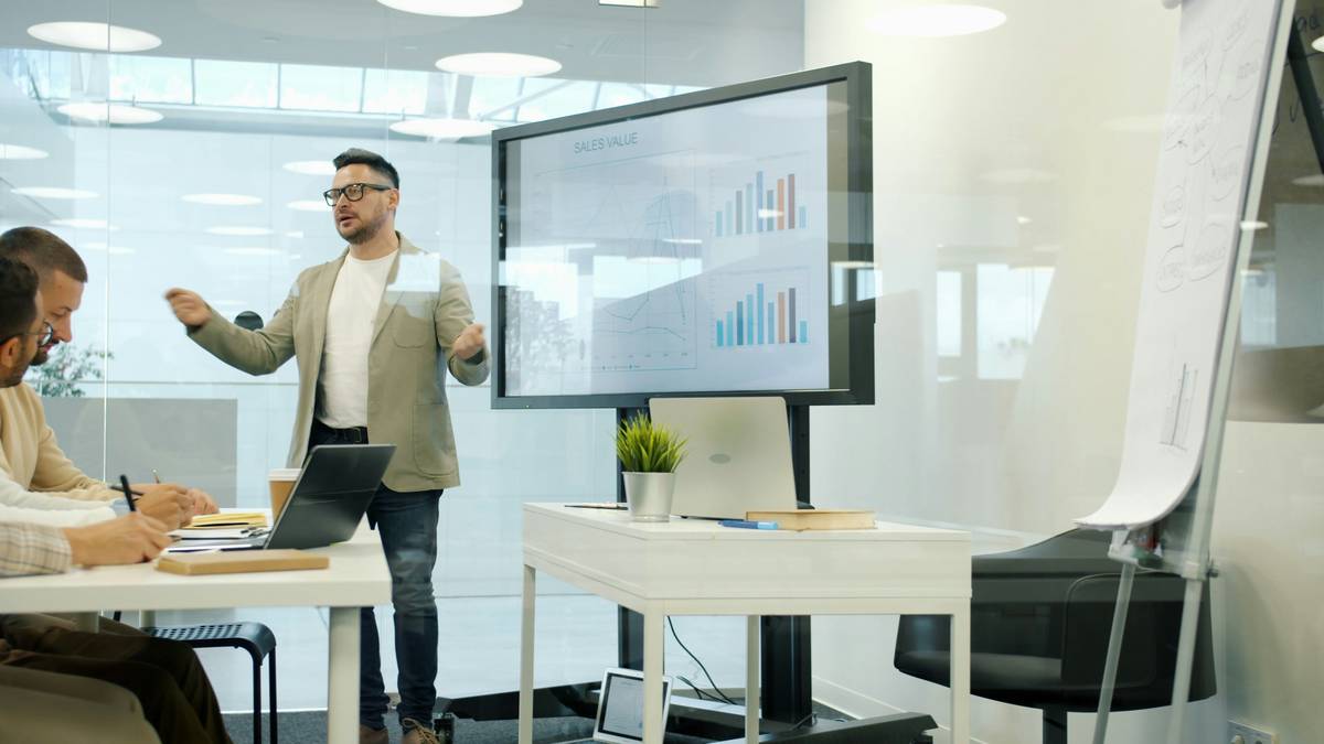 Freelancer creating a compelling freelance showcase with case studies and metrics